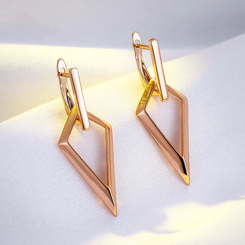 Geometric Elegance: Long Drop Earrings in 585 Rose Gold with Glossy Hollow Design