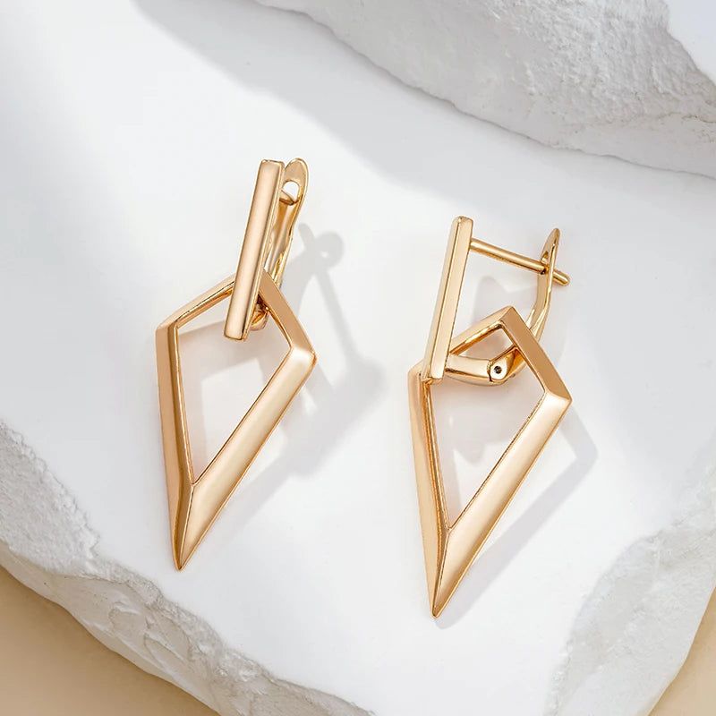 Geometric Elegance: Long Drop Earrings in 585 Rose Gold with Glossy Hollow Design