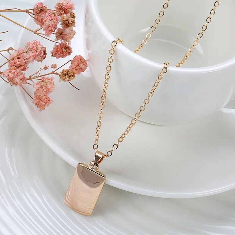 Graceful Rose Gold Square Pendant Necklace with Glossy Finish and Diamond Accents