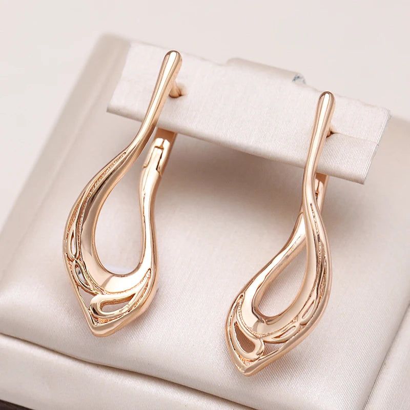 Graceful Rose Gold V-Shaped Dangle Earrings with Glossy Finish and Cubic Zirconia