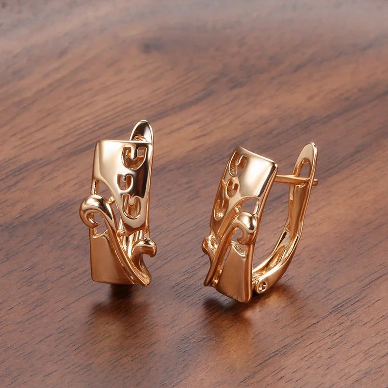 Graceful Rose Gold Wave Dangle Earrings in Glossy Finish - High-Quality Jewelry for Every Occasion