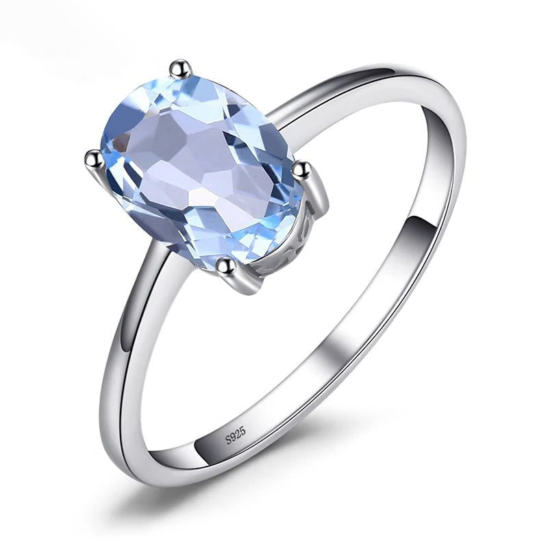 Elegant Oval Blue Topaz Solitaire Ring in 925 Sterling Silver