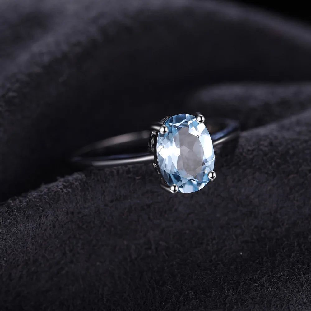 Elegant Oval Blue Topaz Solitaire Ring in 925 Sterling Silver