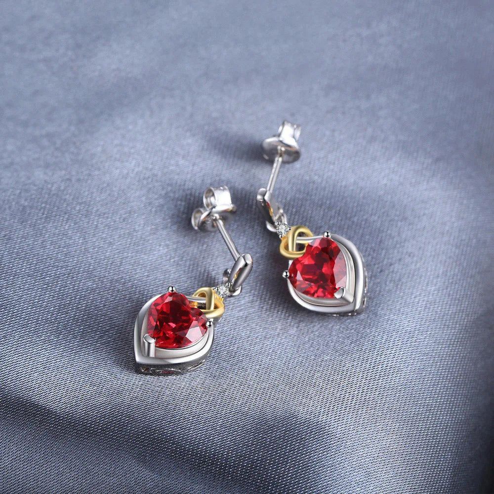 Sophisticated Created Ruby Love Knot Heart Dangle Earrings in 925 Sterling Silver