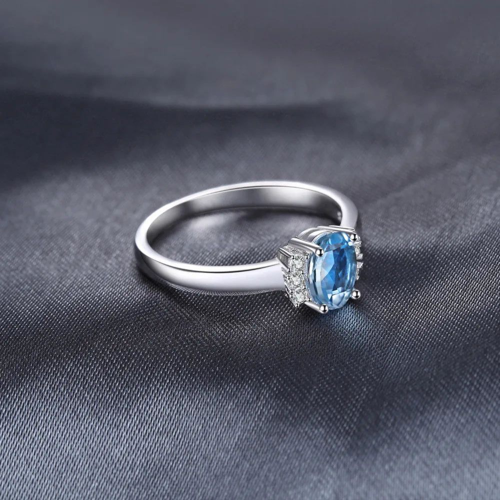 Elegant Oval Sky Blue Topaz Ring in 925 Sterling Silver with Cubic Zirconia