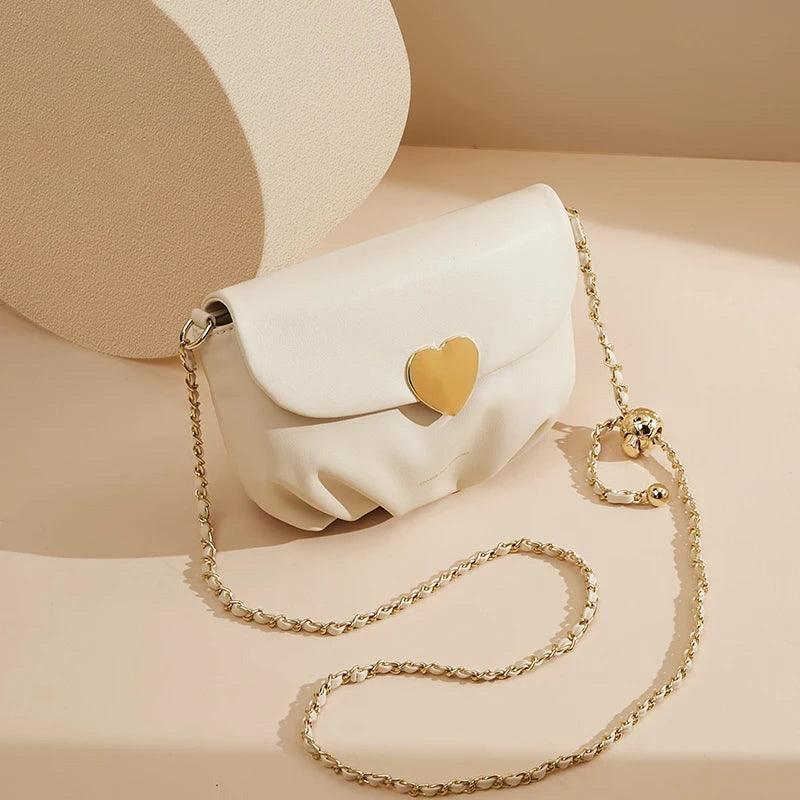 Heart-Shaped Adjustable Chain Crossbody Bag for Women by Foxer - Fashionable Split Leather Messenger with Secure Closure