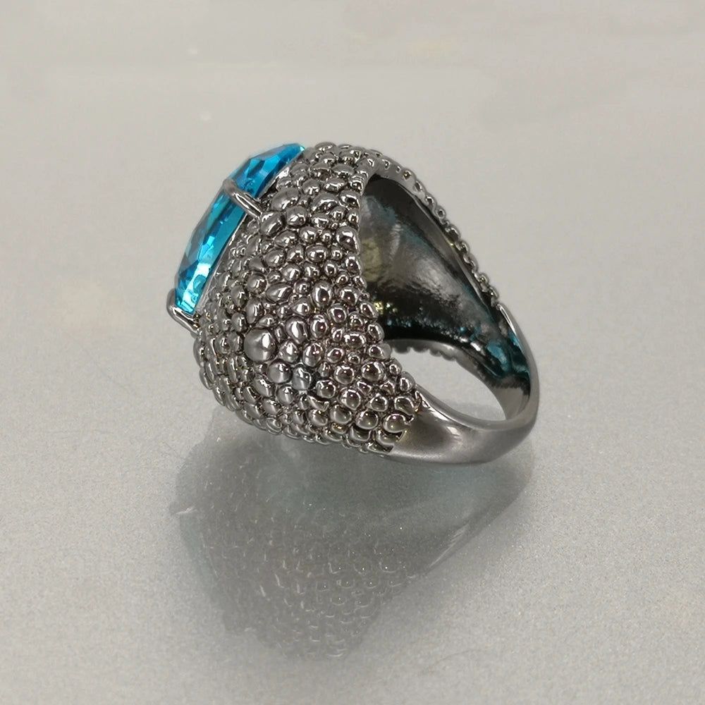 Lizard-Inspired Blue Zircon Cocktail Ring with Dazzling CZ Accents