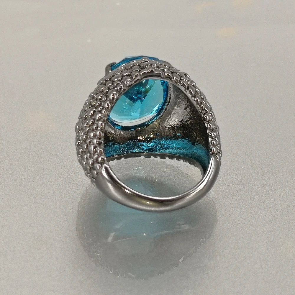 Lizard-Inspired Blue Zircon Cocktail Ring with Dazzling CZ Accents