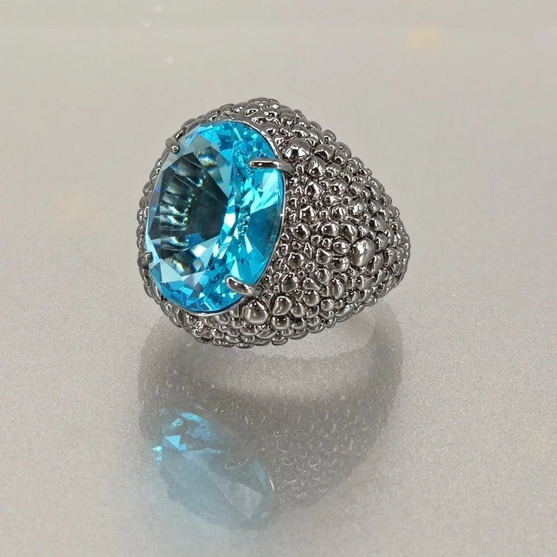 Lizard-Inspired Blue Zircon Cocktail Ring with Dazzling CZ Accents