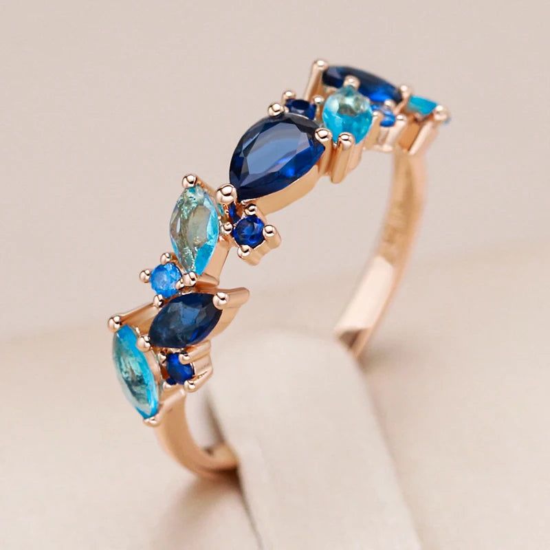 Luxurious 585 Rose Gold Leaf Ring with Vibrant Blue Natural Zircon