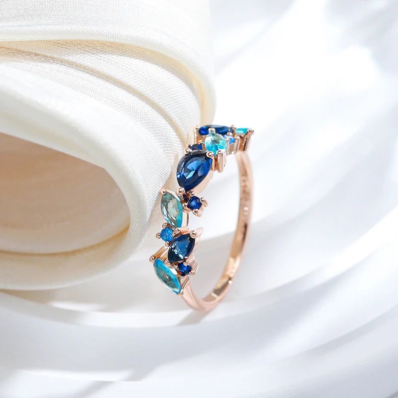 Luxurious 585 Rose Gold Leaf Ring with Vibrant Blue Natural Zircon