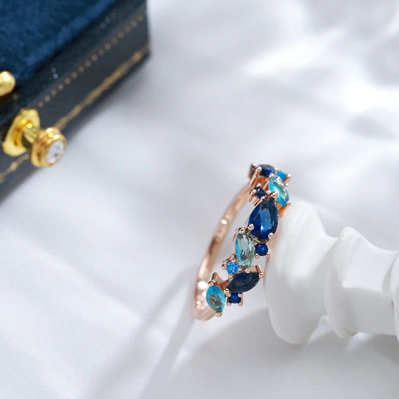 Luxurious 585 Rose Gold Leaf Ring with Vibrant Blue Natural Zircon