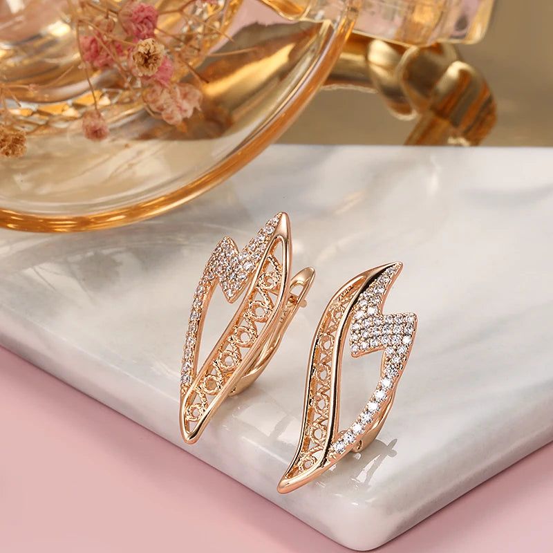 Luxury Wave Earrings in 585 Rose Gold with Natural Zircon Accents