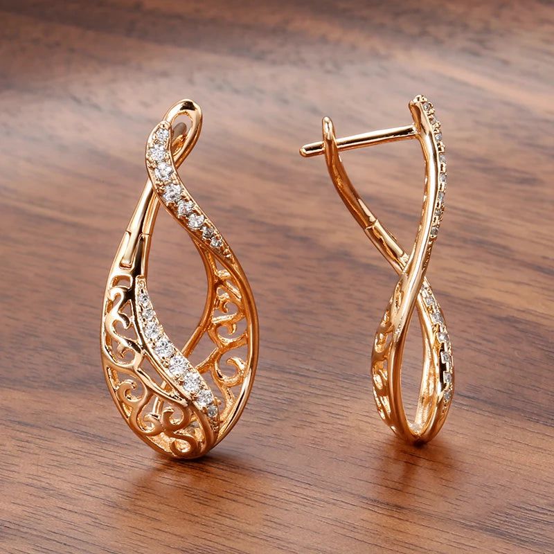 Modern Vintage Hollow Flower Drop Earrings in 585 Rose Gold with Natural Zircon Inlay