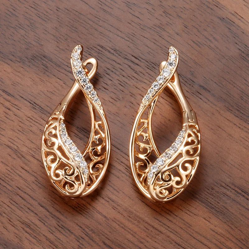 Modern Vintage Hollow Flower Drop Earrings in 585 Rose Gold with Natural Zircon Inlay