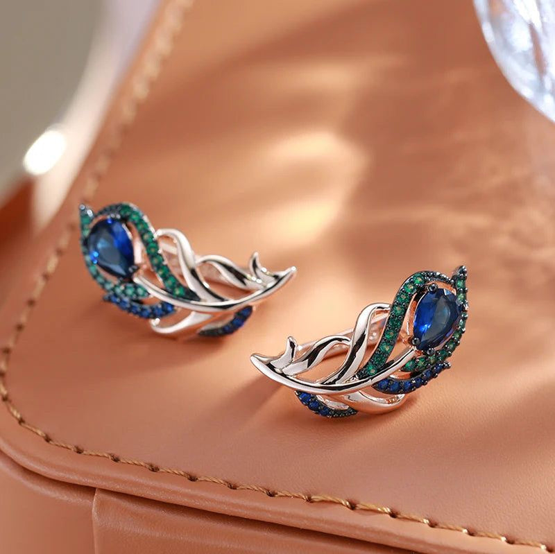 Modern Vintage Hot Blue Natural Zircon Leaf Drop Earrings in 585 Rose Gold with Black Plating