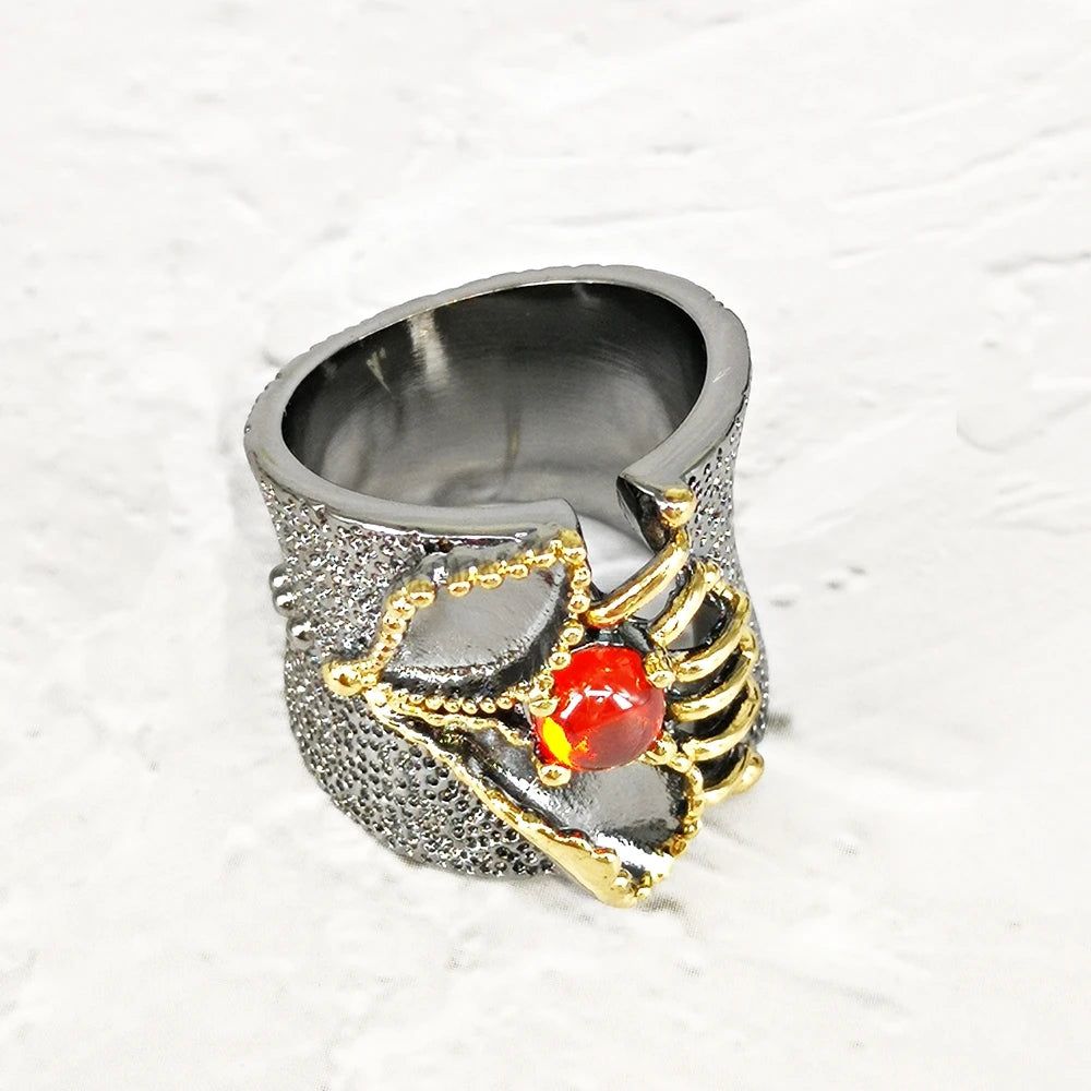 Neo-Gothic Baroque Fissure Ring in Black Gold with Coral-Orange Zircon Accent