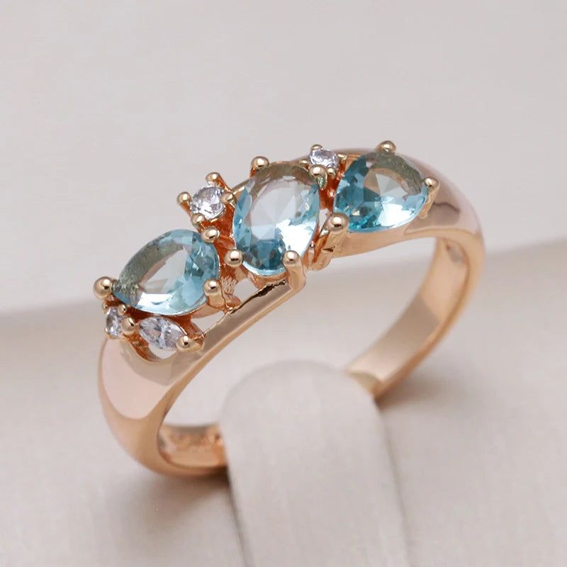 Radiant Blue Zircon Geometric Cocktail Ring in 585 Rose Gold - Vintage Charm Jewelry