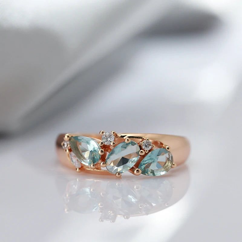 Radiant Blue Zircon Geometric Cocktail Ring in 585 Rose Gold - Vintage Charm Jewelry