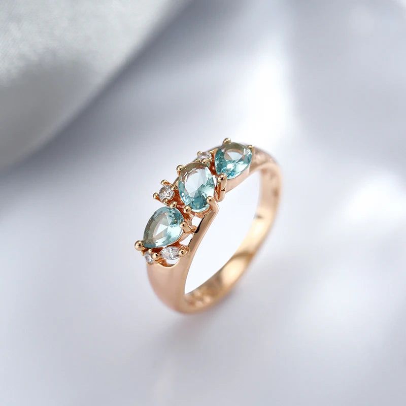 Radiant Blue Zircon Geometric Cocktail Ring in 585 Rose Gold - Vintage Charm Jewelry