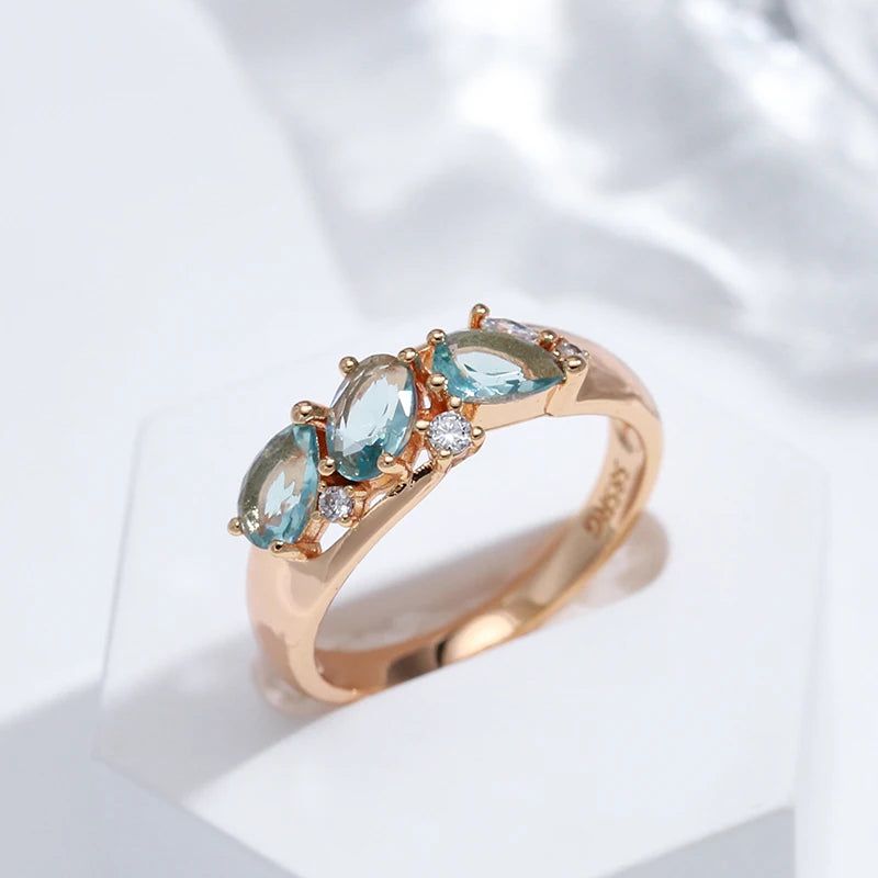 Radiant Blue Zircon Geometric Cocktail Ring in 585 Rose Gold - Vintage Charm Jewelry