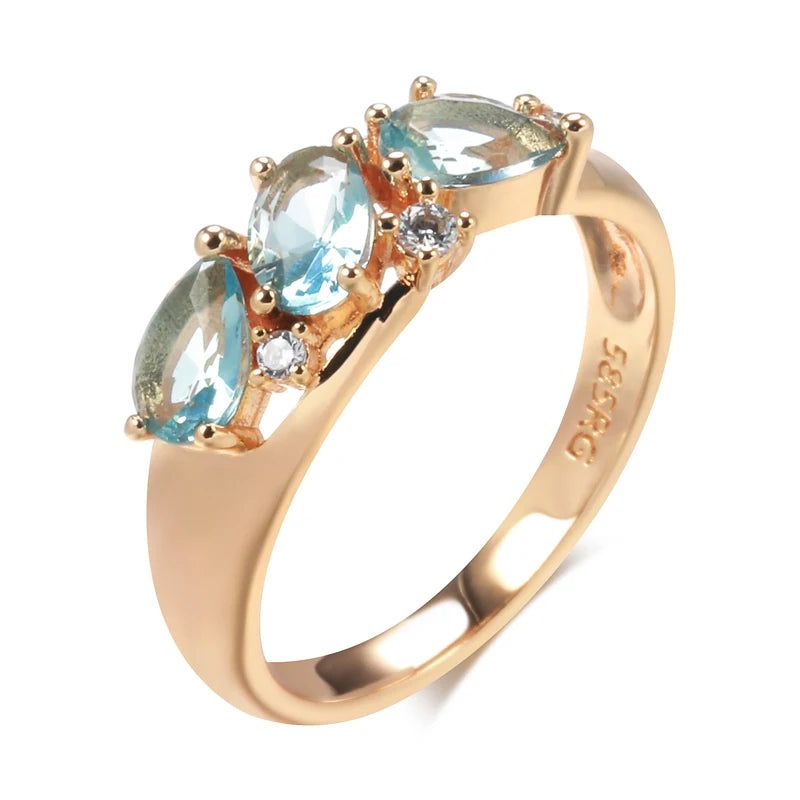 Radiant Blue Zircon Geometric Cocktail Ring in 585 Rose Gold - Vintage Charm Jewelry