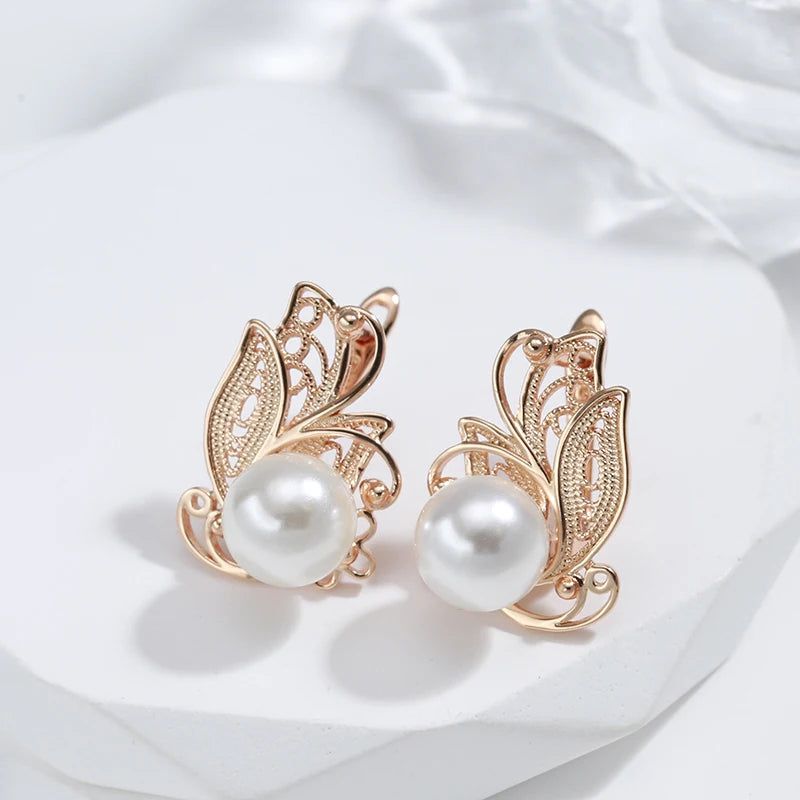 Refined Rose Gold Pearl Drop Earrings with Hollow Floral Design