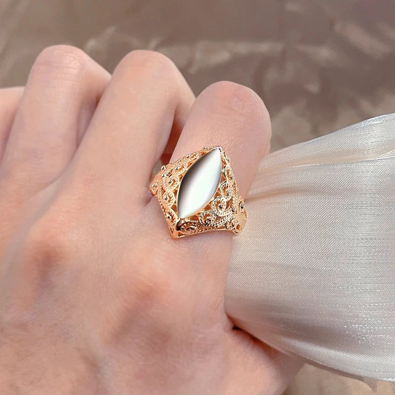 Sleek Rose Gold Rhombus Cocktail Rings with Glossy Finish and Unique Design