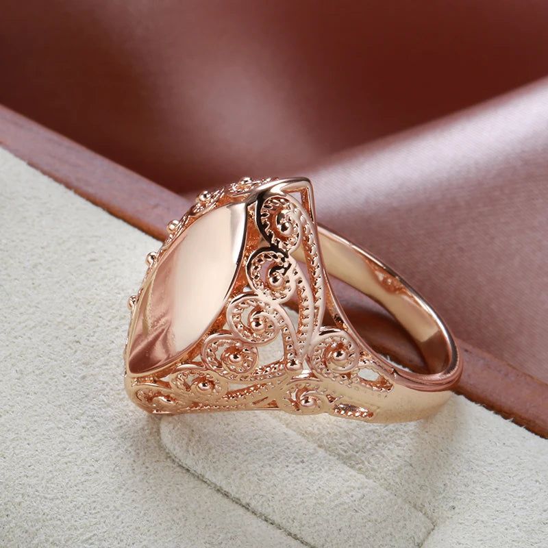 Sleek Rose Gold Rhombus Cocktail Rings with Glossy Finish and Unique Design