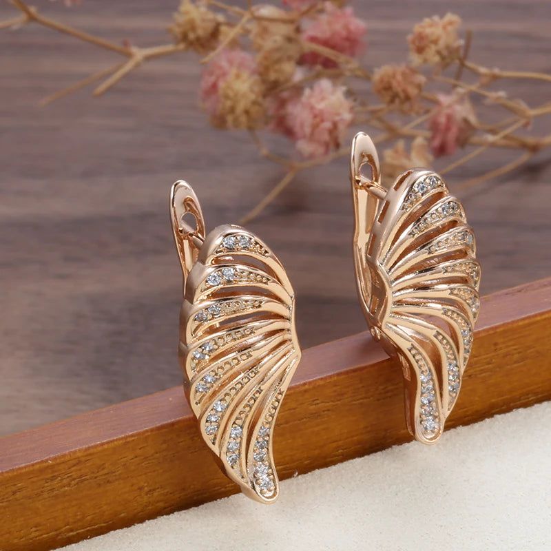 Sophisticated 585 Rose Gold Wing Dangle Earrings with Dazzling Natural Zircon