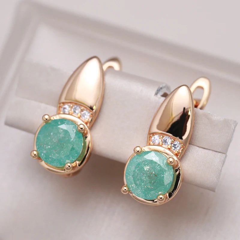 Stunning Emerald Round Cut Zircon Clip Earrings in 585 Rose Gold with Natural White Zircon for Fashionable Occasions