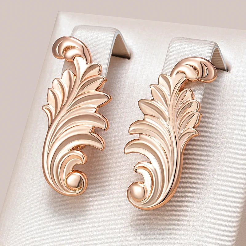 Stylish Rose Gold Color Dangle Earrings with Glossy Finish and Timeless Design