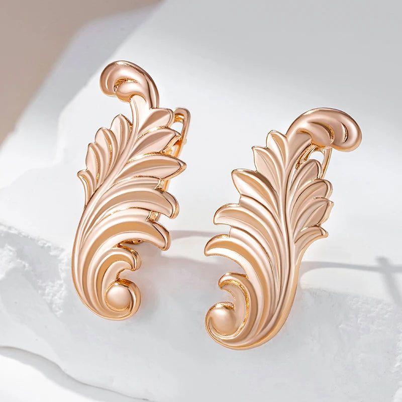 Stylish Rose Gold Color Dangle Earrings with Glossy Finish and Timeless Design