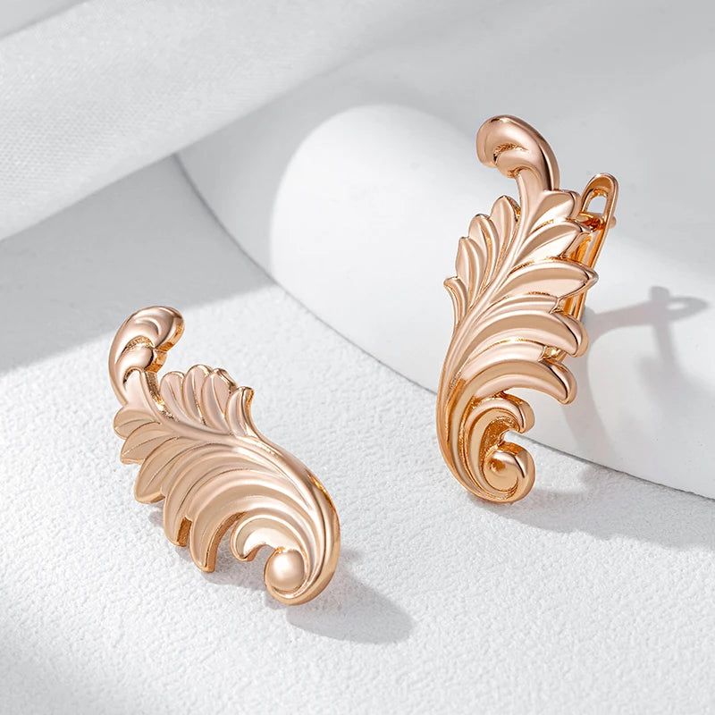 Stylish Rose Gold Color Dangle Earrings with Glossy Finish and Timeless Design