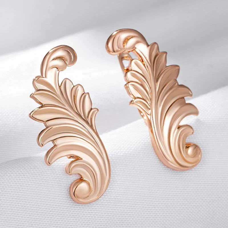 Stylish Rose Gold Color Dangle Earrings with Glossy Finish and Timeless Design