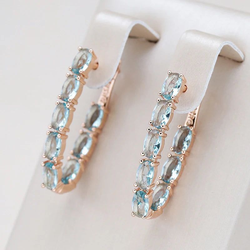 Tasteful Long Drop Earrings with Natural Blue Zircon in 585 Rose Gold