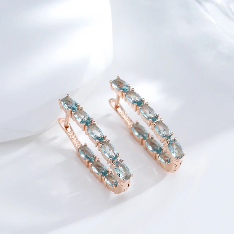 Tasteful Long Drop Earrings with Natural Blue Zircon in 585 Rose Gold