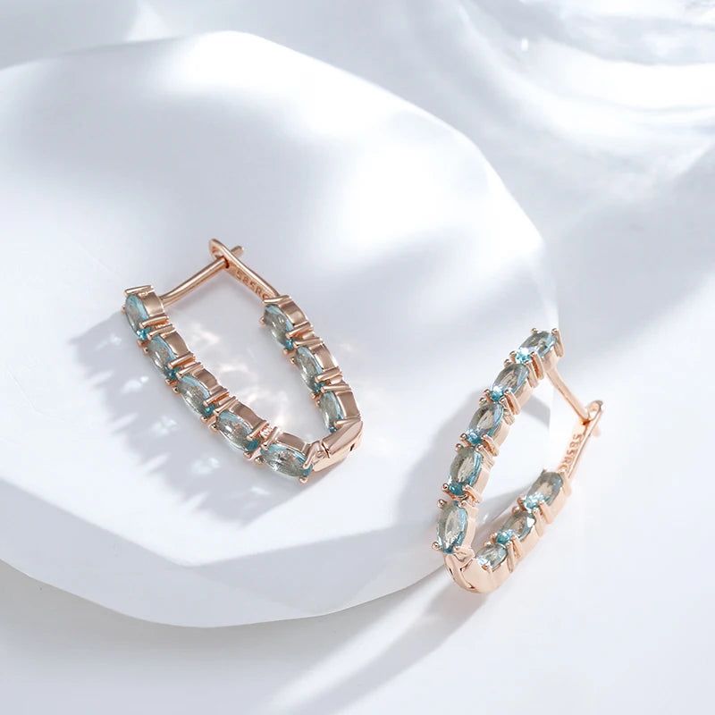 Tasteful Long Drop Earrings with Natural Blue Zircon in 585 Rose Gold