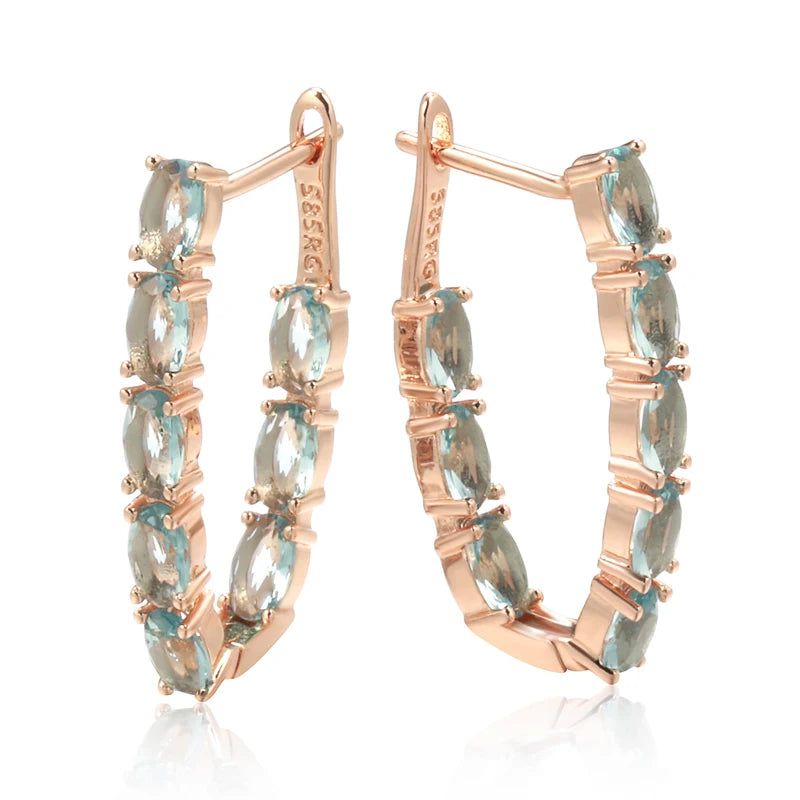 Tasteful Long Drop Earrings with Natural Blue Zircon in 585 Rose Gold