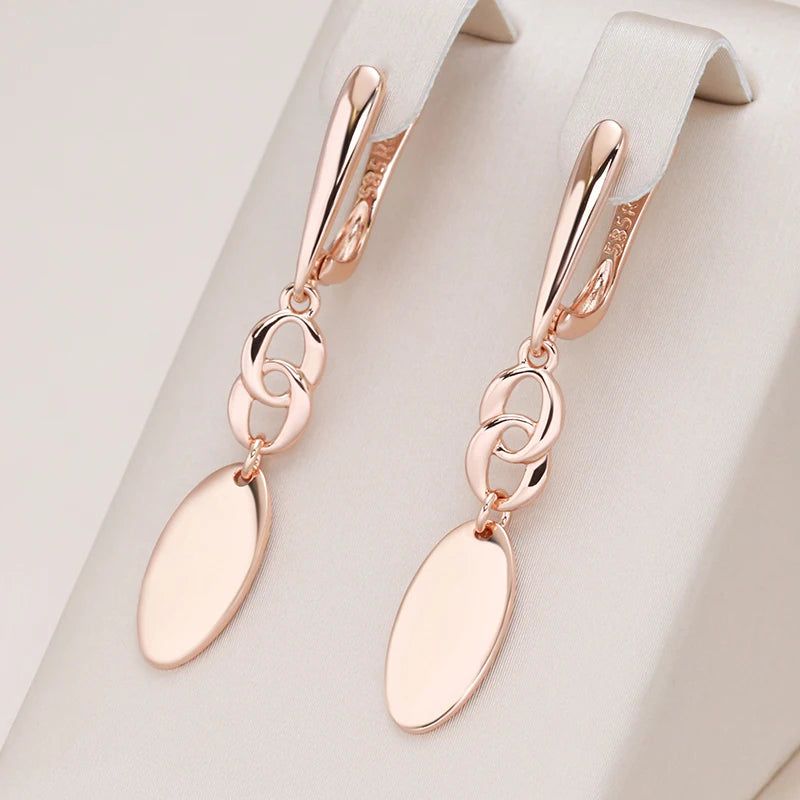 Trendy Geometric Rose Gold Dangle Earrings in Glossy Finish - High-Quality Fashion Jewelry