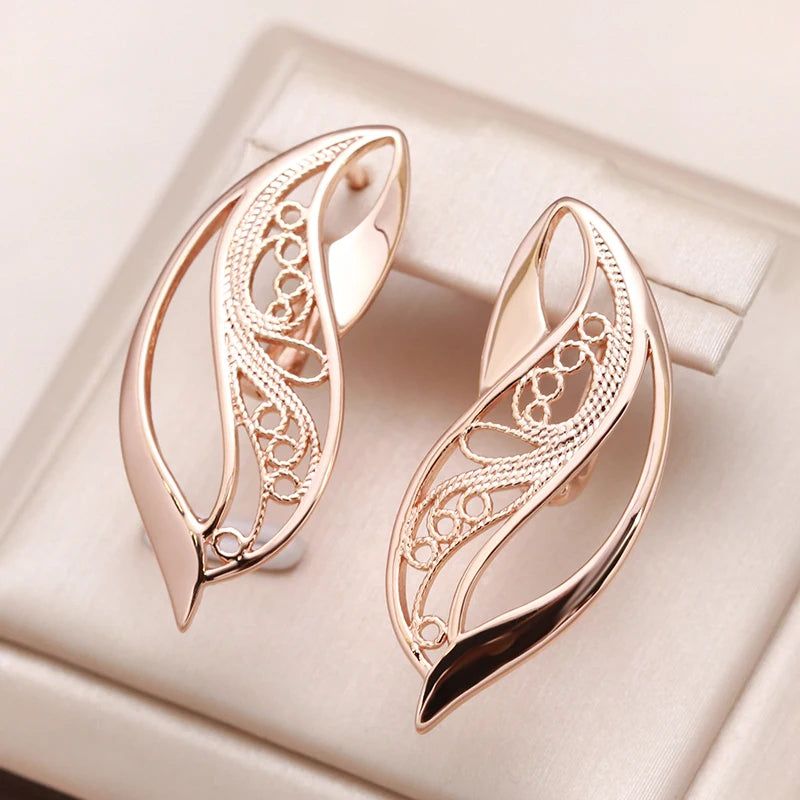 Trendy Rose Gold Hollow Drop Earrings with Glossy Finish and Geometric Design