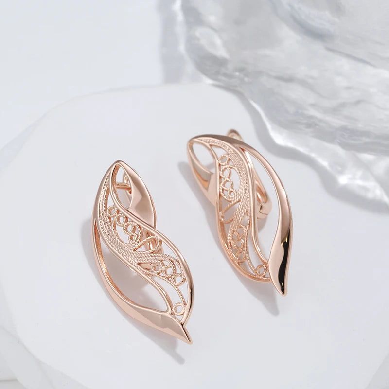 Trendy Rose Gold Hollow Drop Earrings with Glossy Finish and Geometric Design