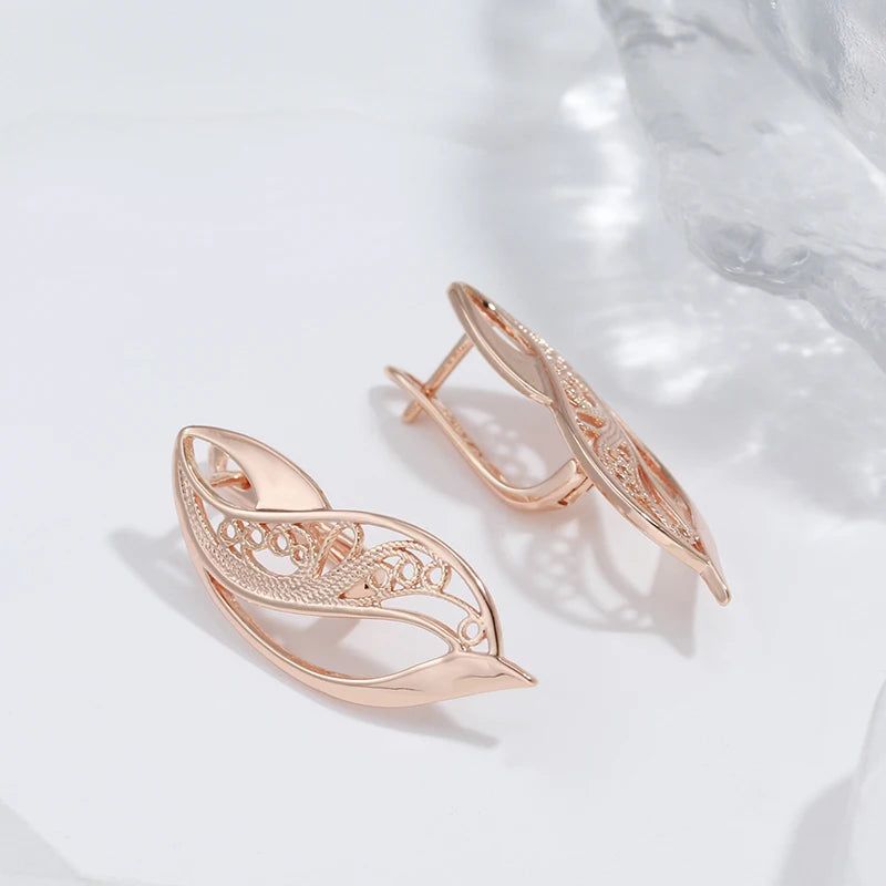 Trendy Rose Gold Hollow Drop Earrings with Glossy Finish and Geometric Design