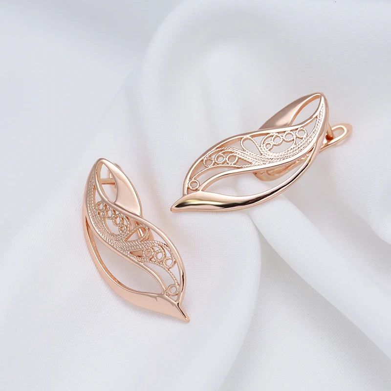 Trendy Rose Gold Hollow Drop Earrings with Glossy Finish and Geometric Design