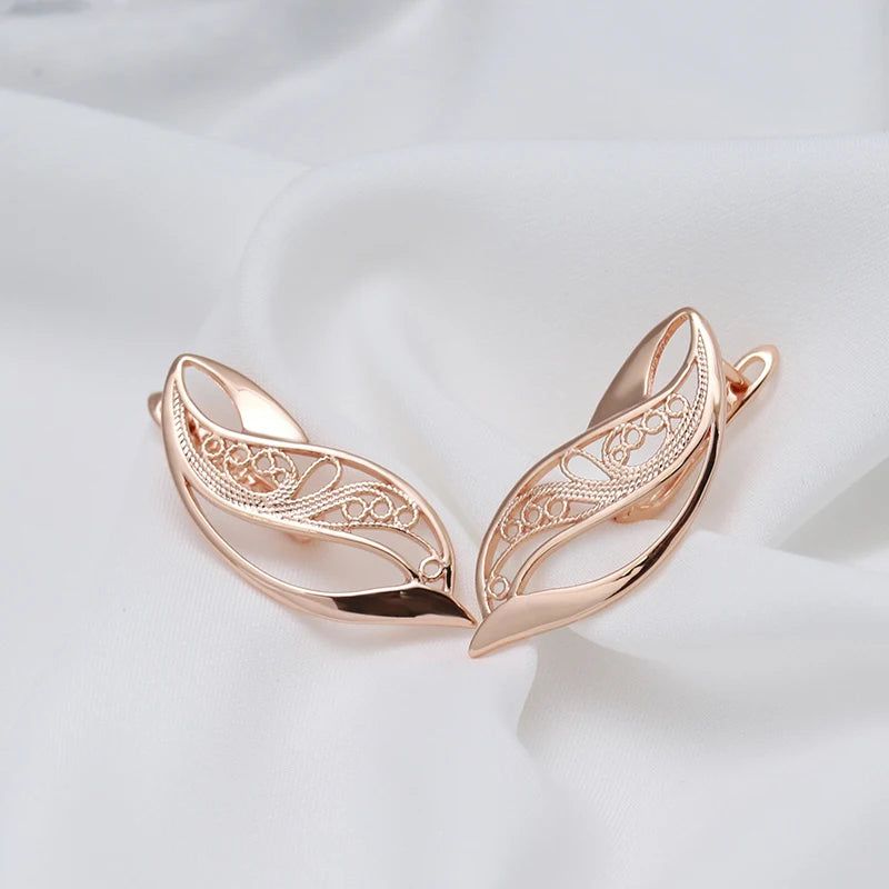 Trendy Rose Gold Hollow Drop Earrings with Glossy Finish and Geometric Design