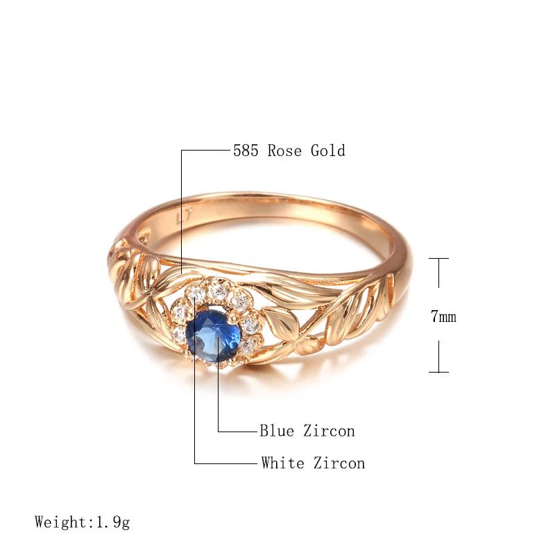 Vintage-Inspired Blue Zircon Rose Gold Cocktail Ring with Hollow Crystal Flower Design