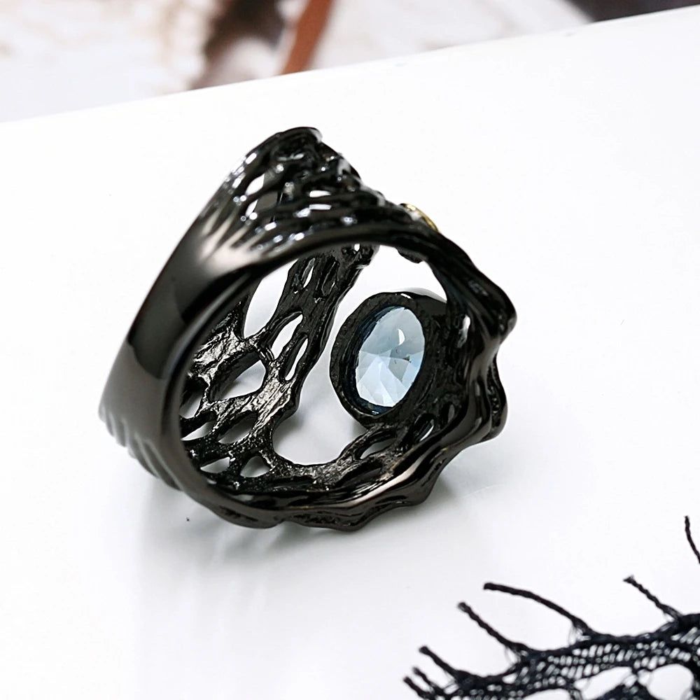 Vintage Neo-Gothic Black Gold Braided Ring with Sea Blue Zirconia