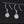 White Gold (9k) Swirl Drop Dangle Earrings with 0.04ct Diamond Pave and 5ct White Freshwater Pearl