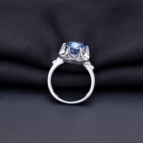 Sterling Silver Floral Blue Topaz Ring