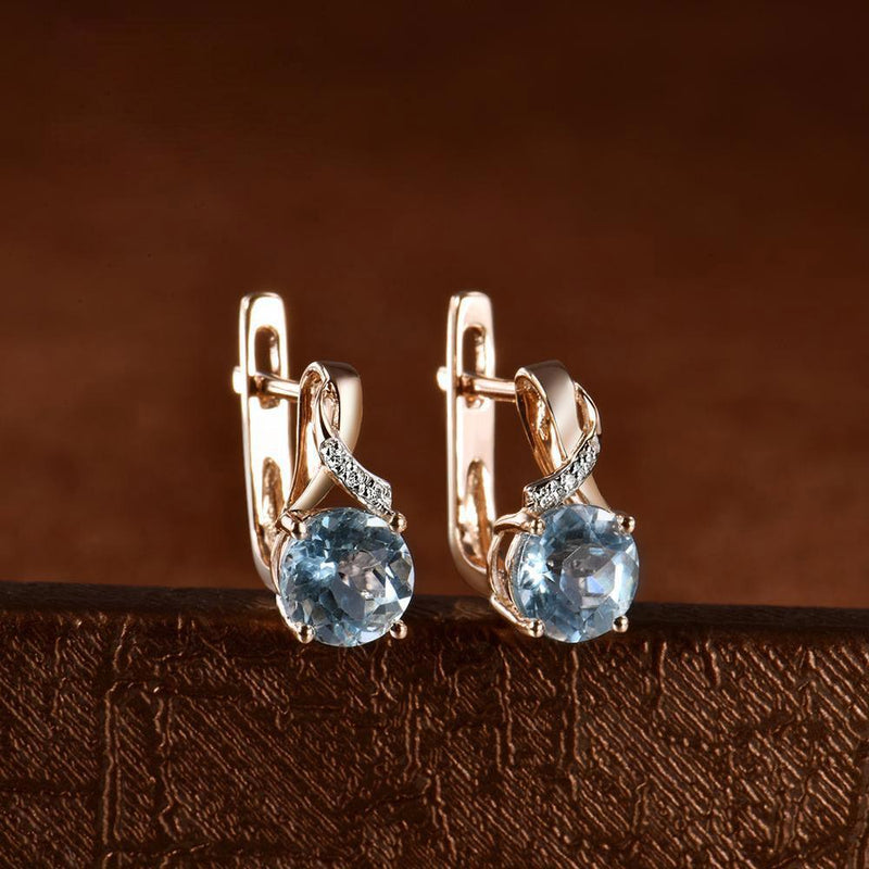 Elegant 14k Rose Gold Jewelry Set with Sky Blue Topaz and Diamond Accents - Earrings, Ring, and Pendant - Lucid Fantasy 